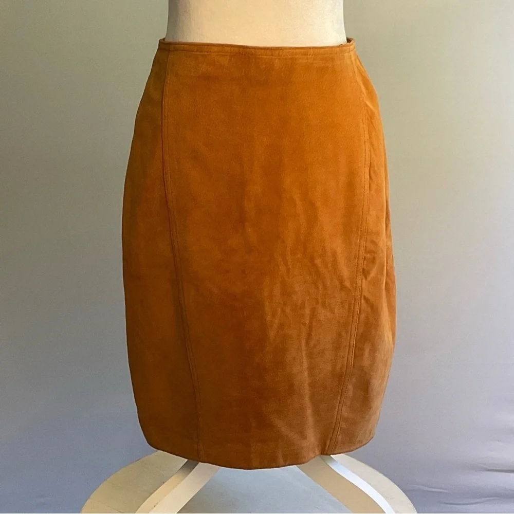 True vintage suede—real leather with clean tailoring an earlier designer era.
